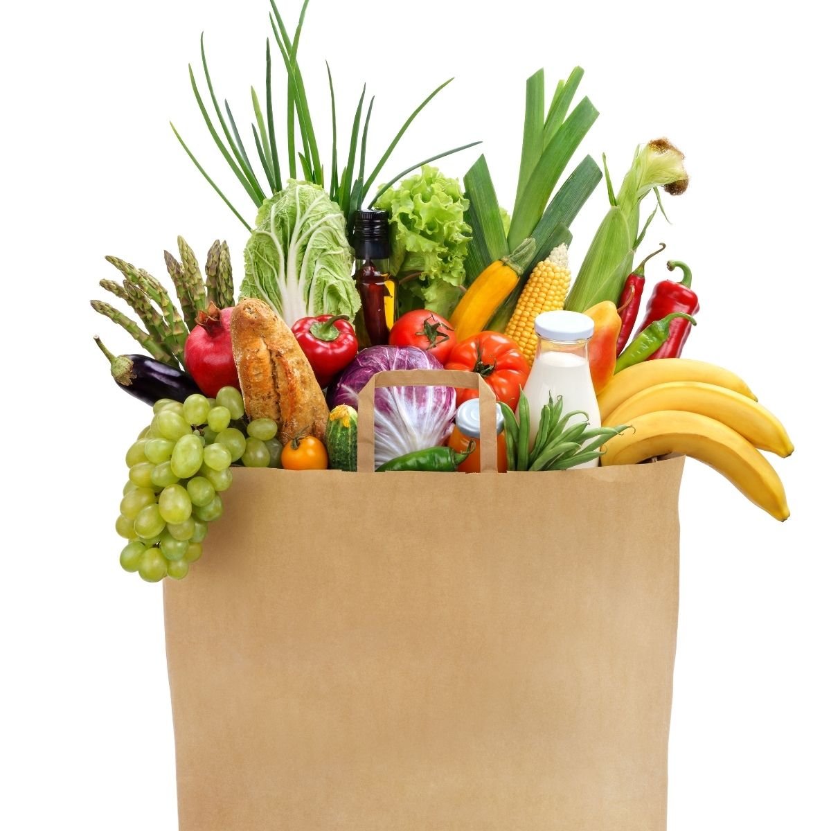 brown bag of groceries filled with items from a vegan grocery list like fresh fruits, and vegetables.