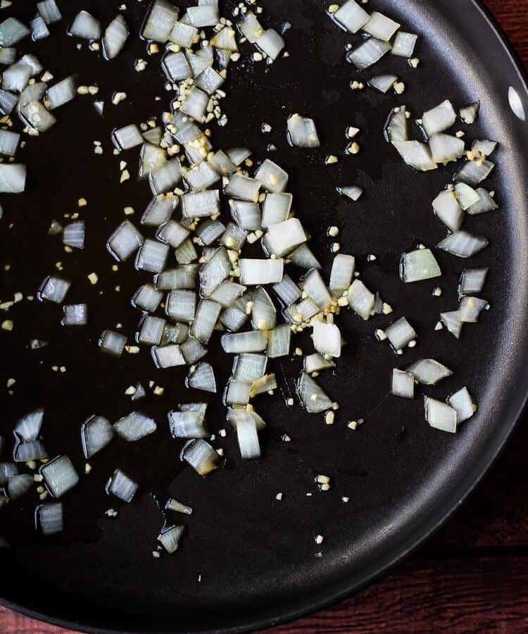 onions and garlic in pan