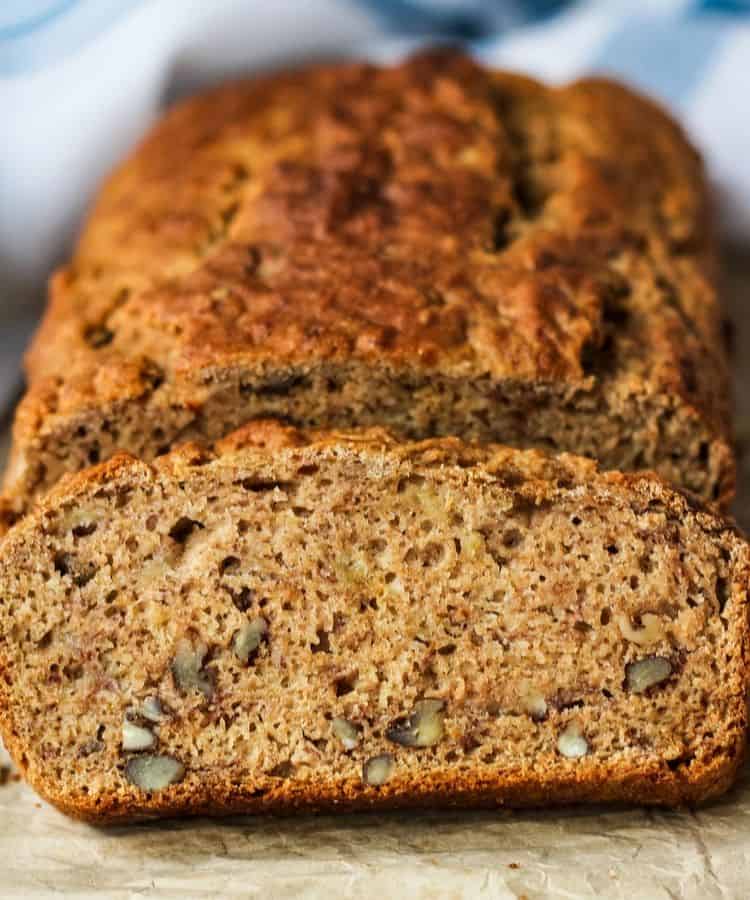 straight on close up of dairy free banana bread loaf and slice