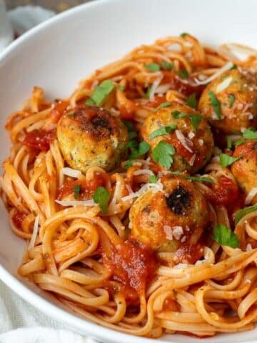 Bowl of spaghetti with vegan meatballs.