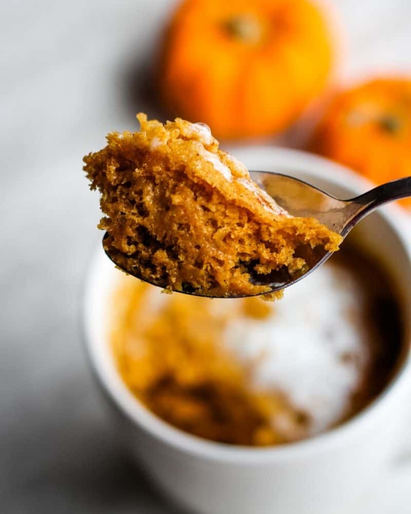 Pumpkin cake on spoon.