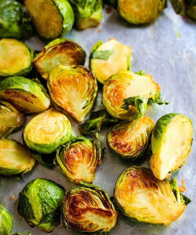 Roasted soy sauce brussels sprouts on baking sheet. 