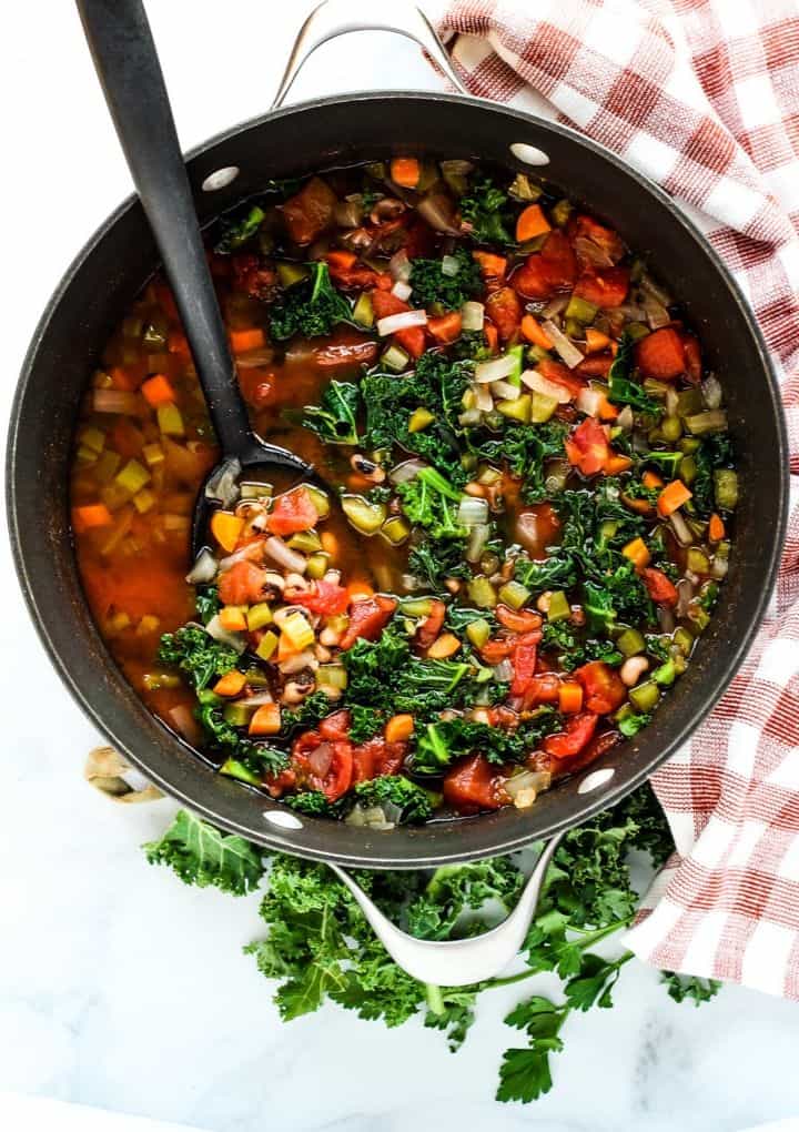 black eyed pea soup with kale in pot
