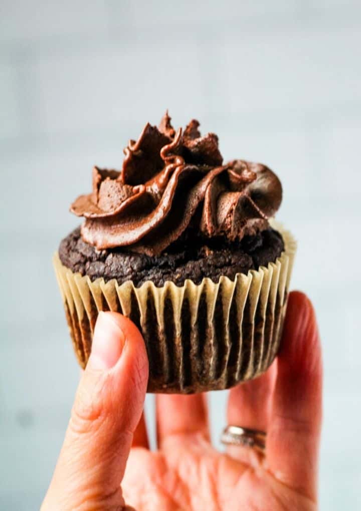 chocolate vegan cupcakes in hand