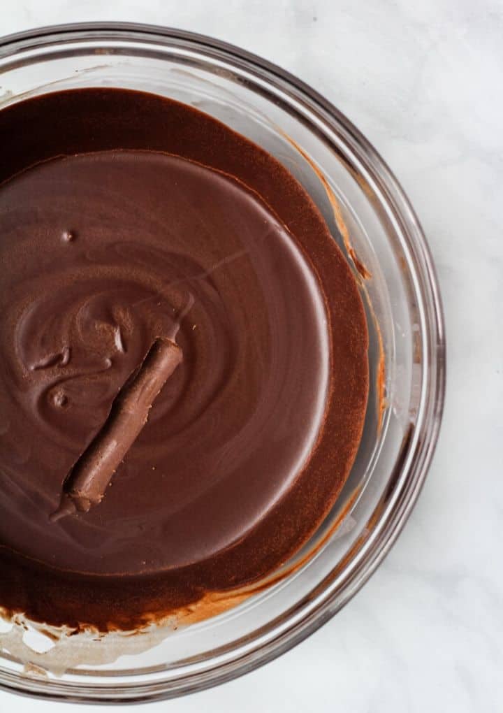 chocolate vegan frosting with scoop 