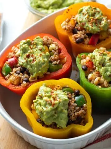 Colorful vegan mexican stuffed peppers.