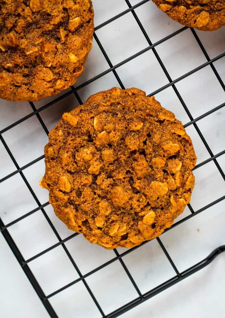 close up of oatmeal cookie on cooling rack