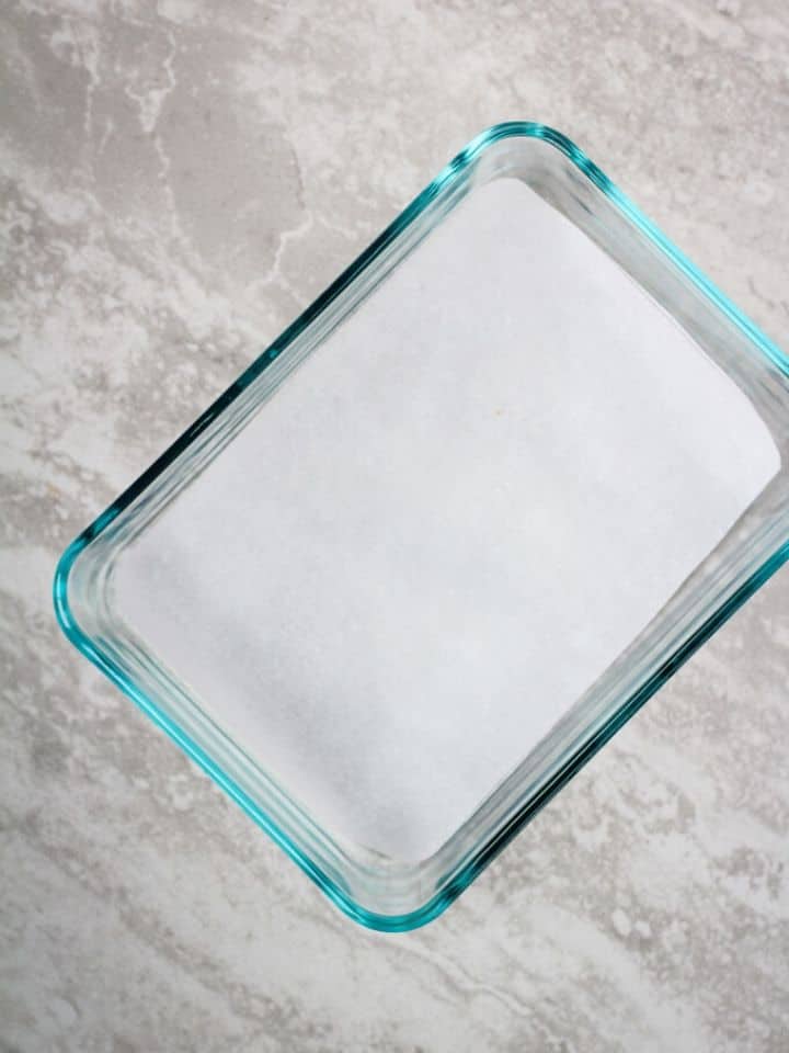 glass container lined with parchment paper