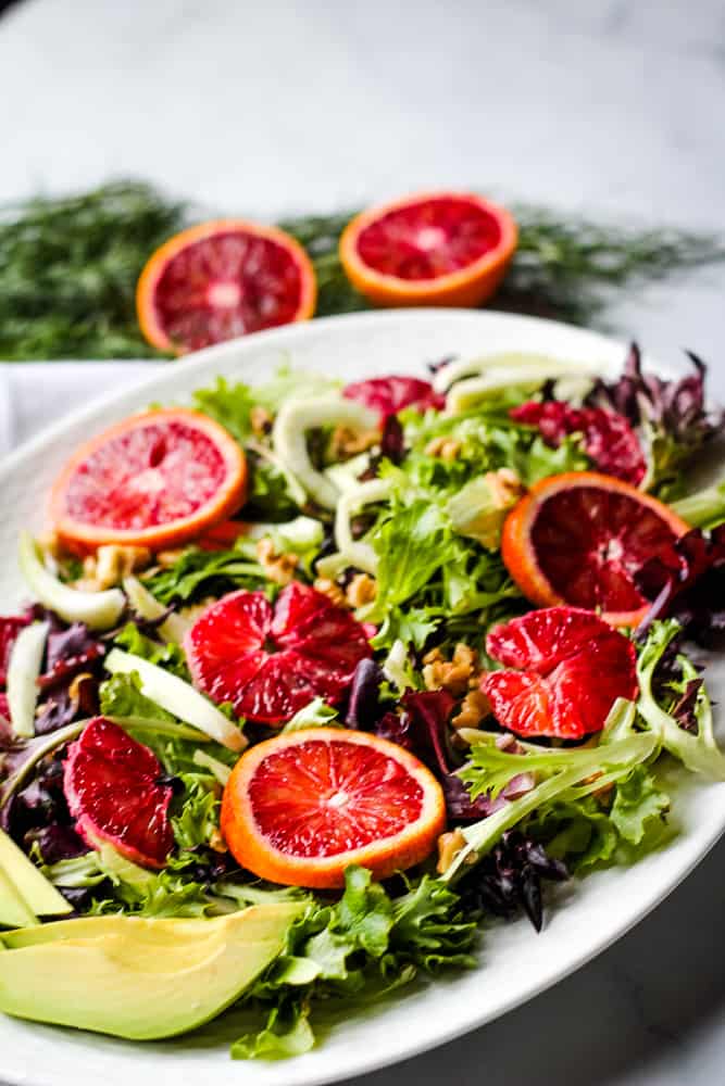 blood orange salad on white platter