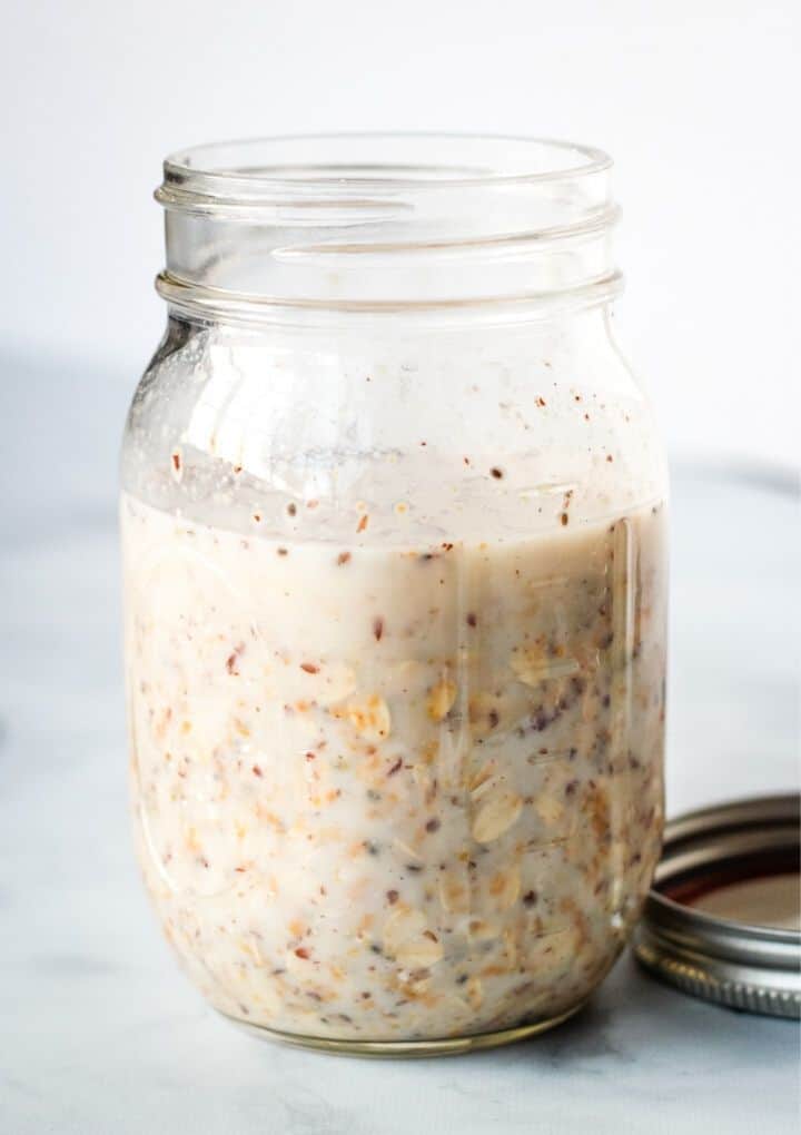 oats, almond milk, and flax in mason jar before it goes into the refrigerator to chill 