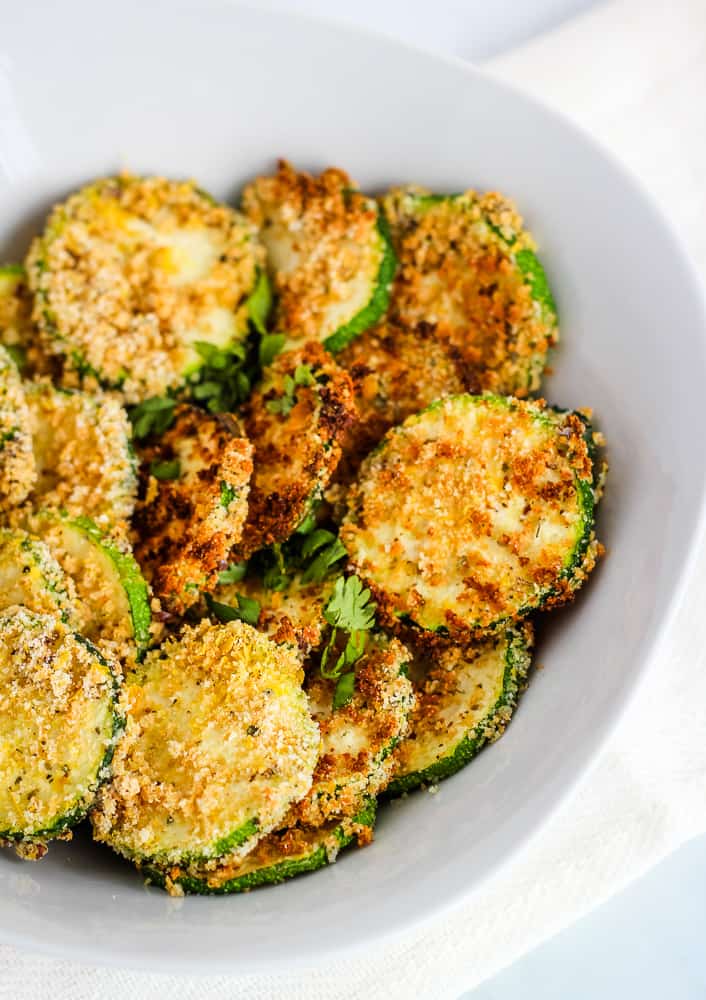 air fryer zucchini chips in white bowl
