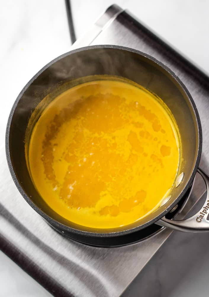 Pot of golden milk boiling. 