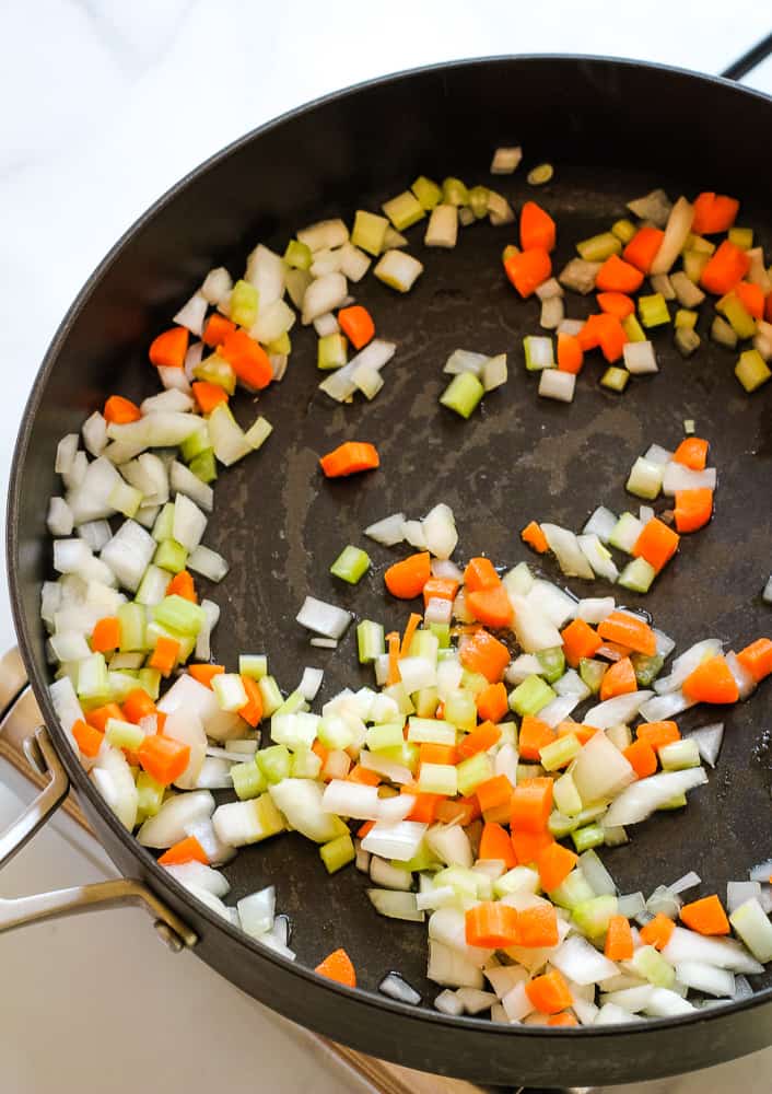Diced onion, celery, and carrots in lage pot.
