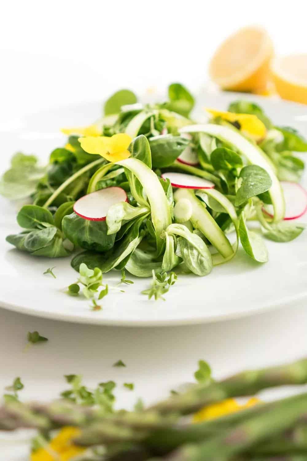 bright green spring salad with radishes