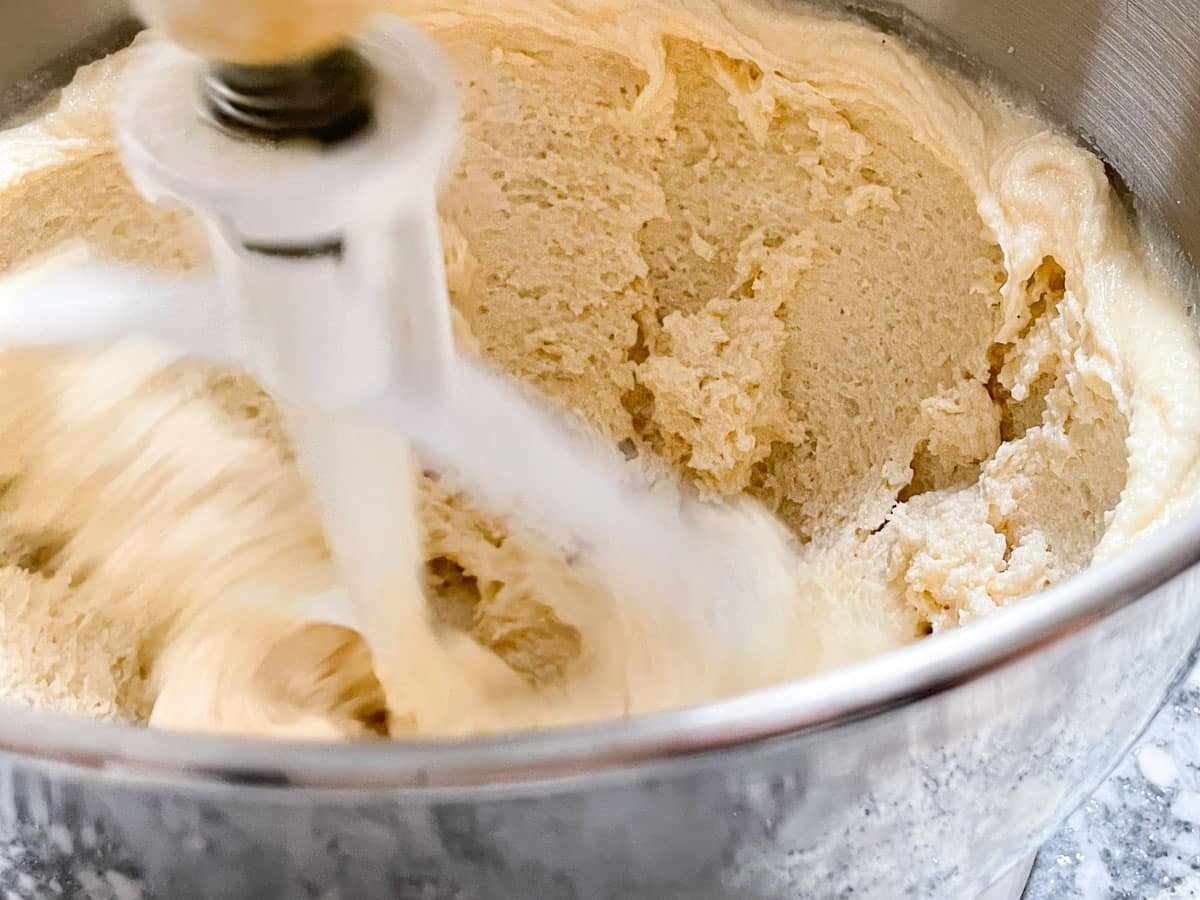 Butter and sugar beating together in stand-mixer.
