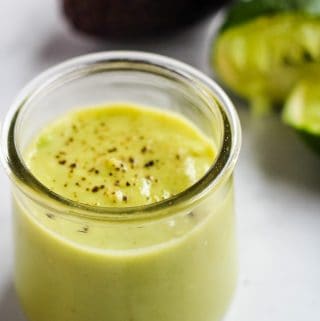 vegan avocado dressing in glass jar