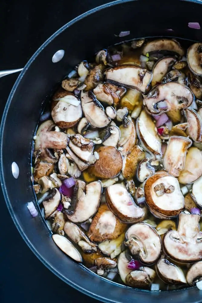 mushrooms sautéd in pot