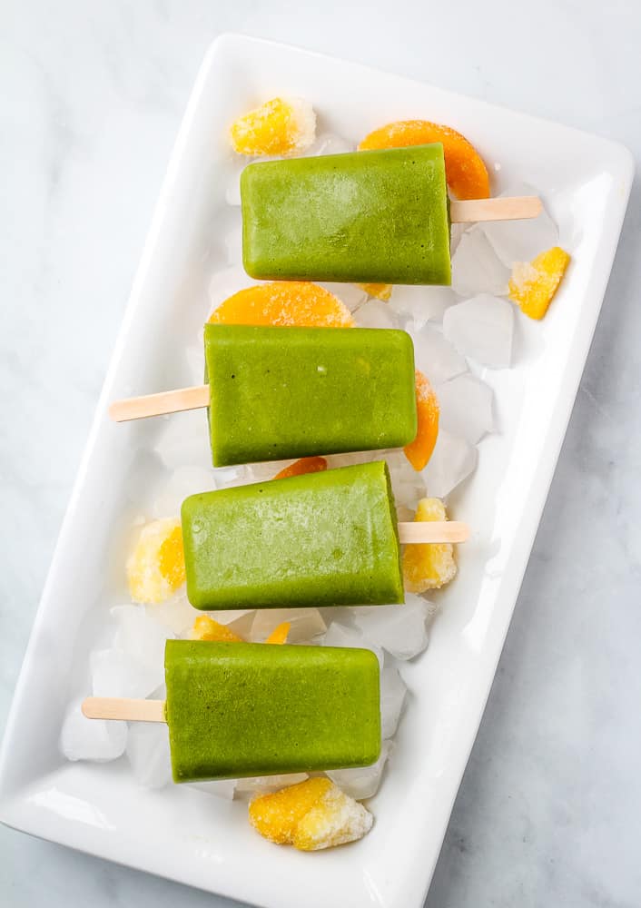 overhead of spinach vegan popsicles