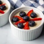 Vanilla pudding topped with fresh berries.