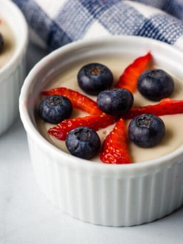 Vanilla pudding topped with fresh berries.