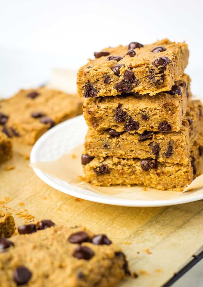 stack of 4 vegan blondies on white plate