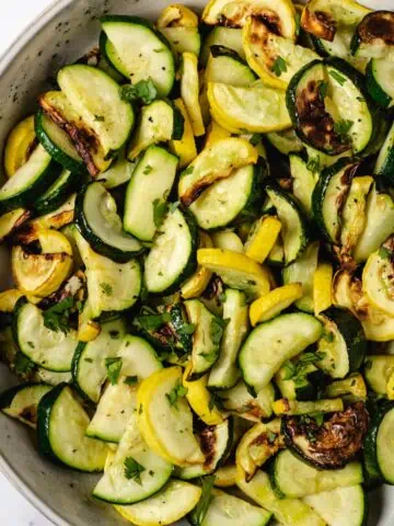 Zucchini and yellow squash in serving bowl.