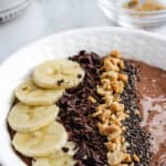 chocolate smoothie bowl with bananas and chocolate chunks