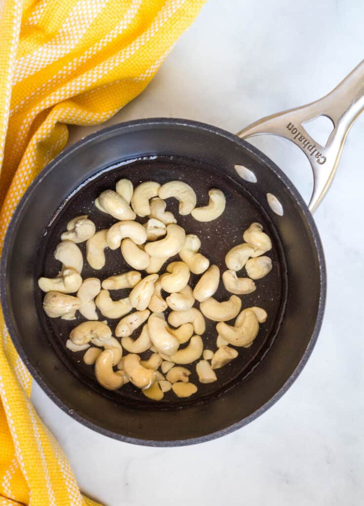 cashews in saucepan with water