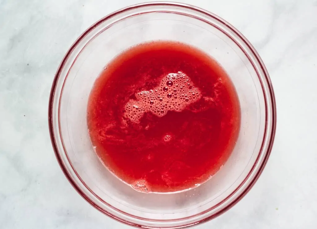 strained watermelon juice in glass bowl