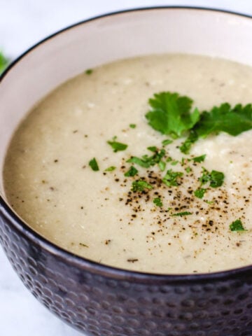 Bowl of vegan cauliflower soup.