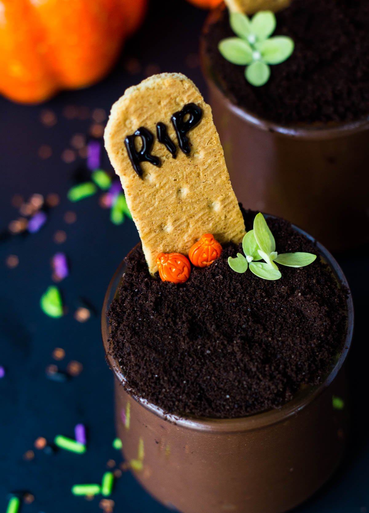Graveyard pudding cup with RIP on graham cracker. 
