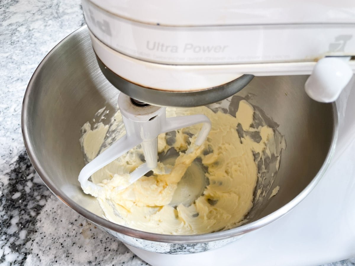 Butter beating in stand-mixer.