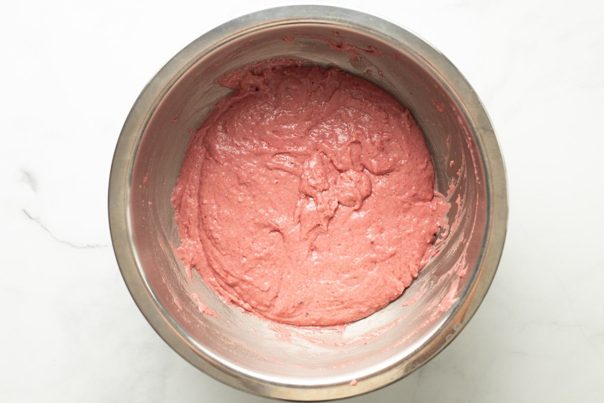 Strawberry cake batter in mixing bowl.
