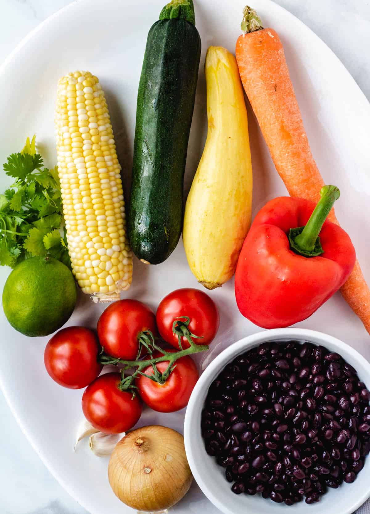 assorted vegetables on white platter