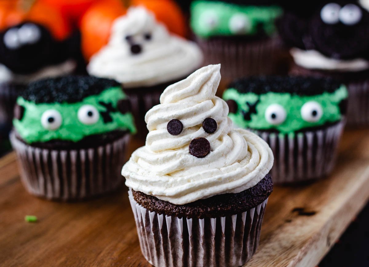 ghost cupcake with monster cupcakes in background