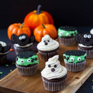 halloween cupcakes, a ghost, monster, and bat