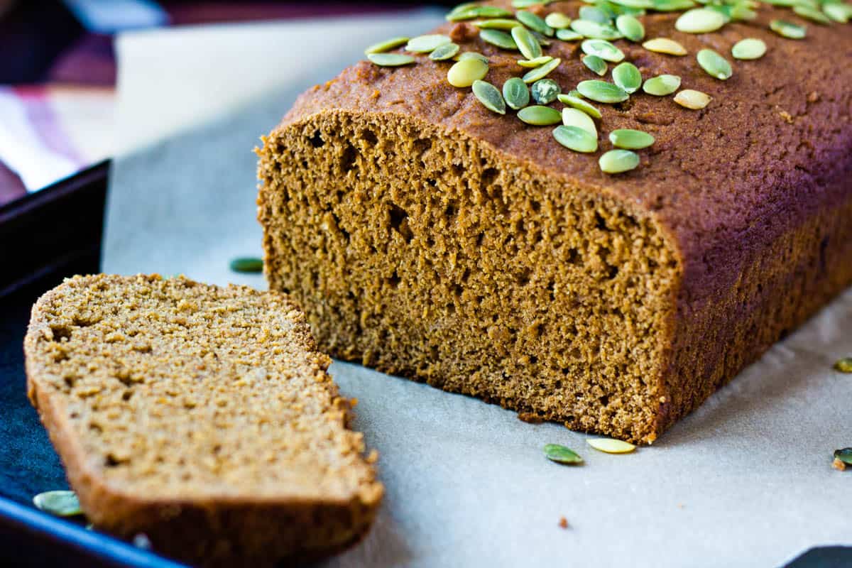 pumpkin banana bread loaf with slice cut off the end