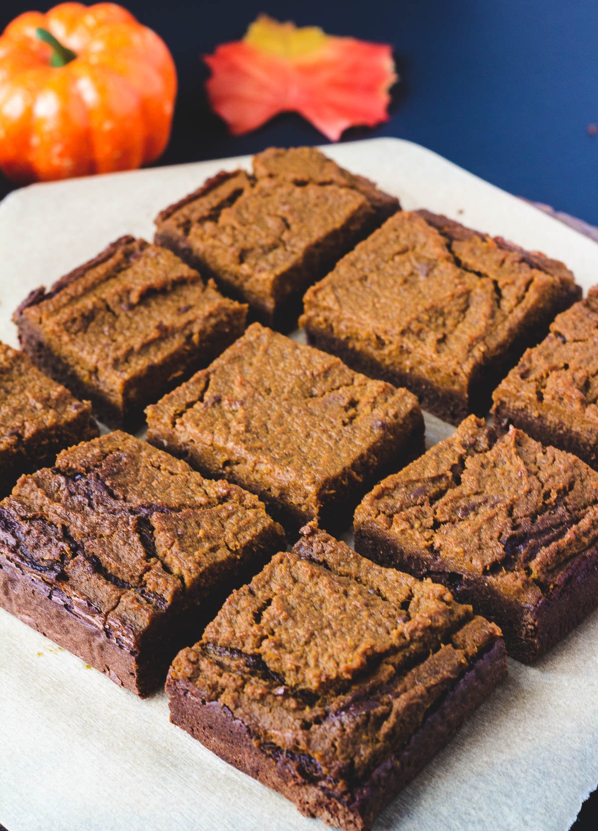Vegan pumpkin brownies cut into squares.