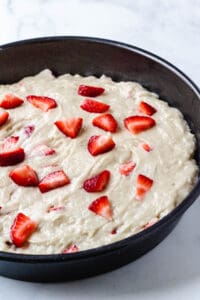 strawberry cake batter in pan