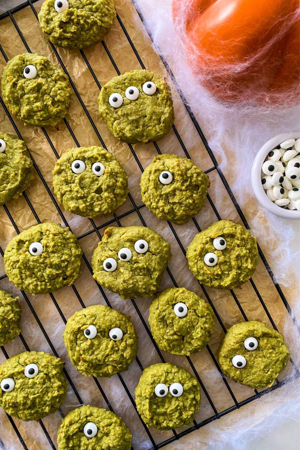 Green cookies with candy eyes.