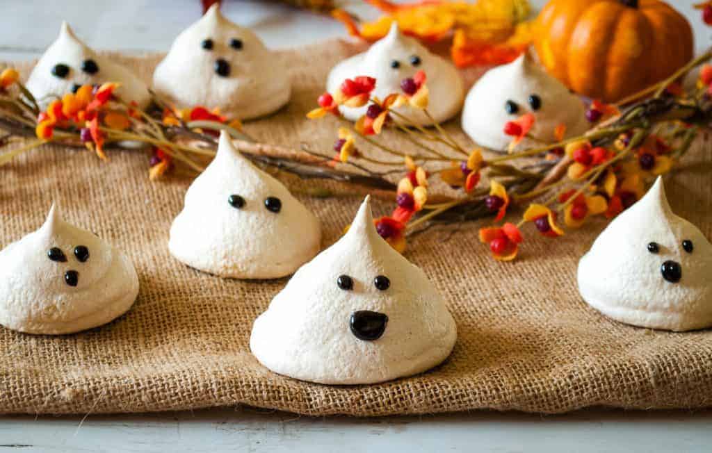 Meringue cookies made to look like ghosts.