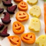 Beets in the shape of witches hats, potatoes in the shape of ghosts, and sweet potatoes in the shape of pumpkins.