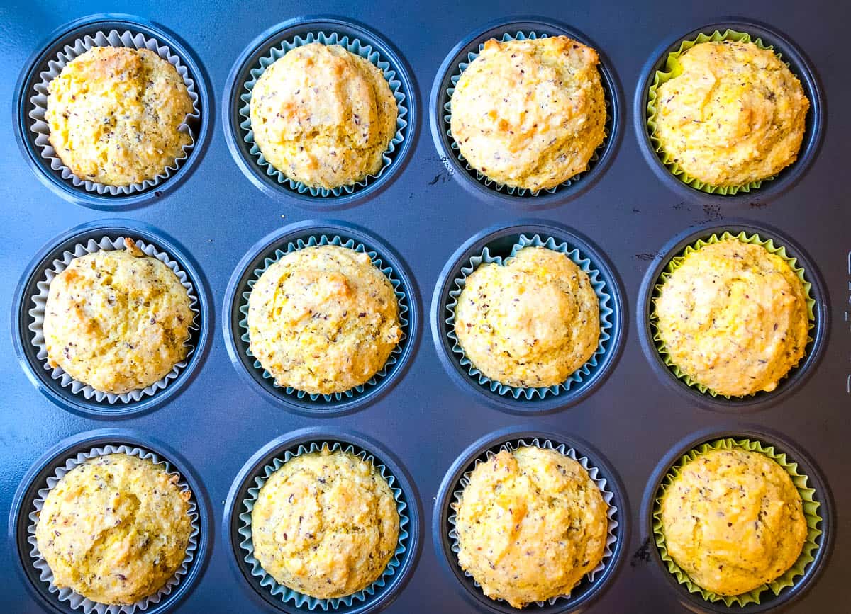 Baked vegan cornbread muffins in muffin tin.