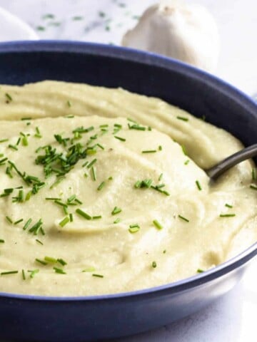 vegan mashed potatoes with almond milk in blue bowl