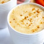 vegan pumpkin spice latte in white mug