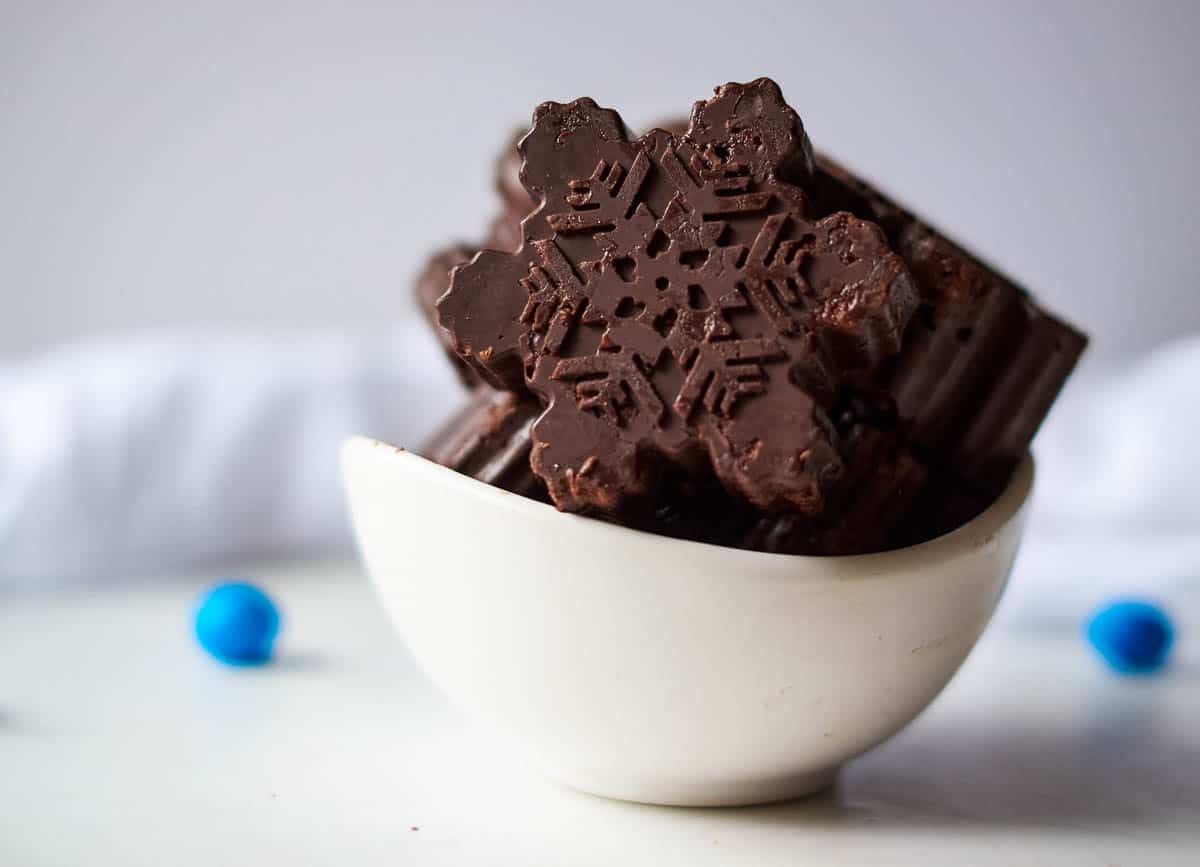 Dark chocolate in the shape of snowflakes.