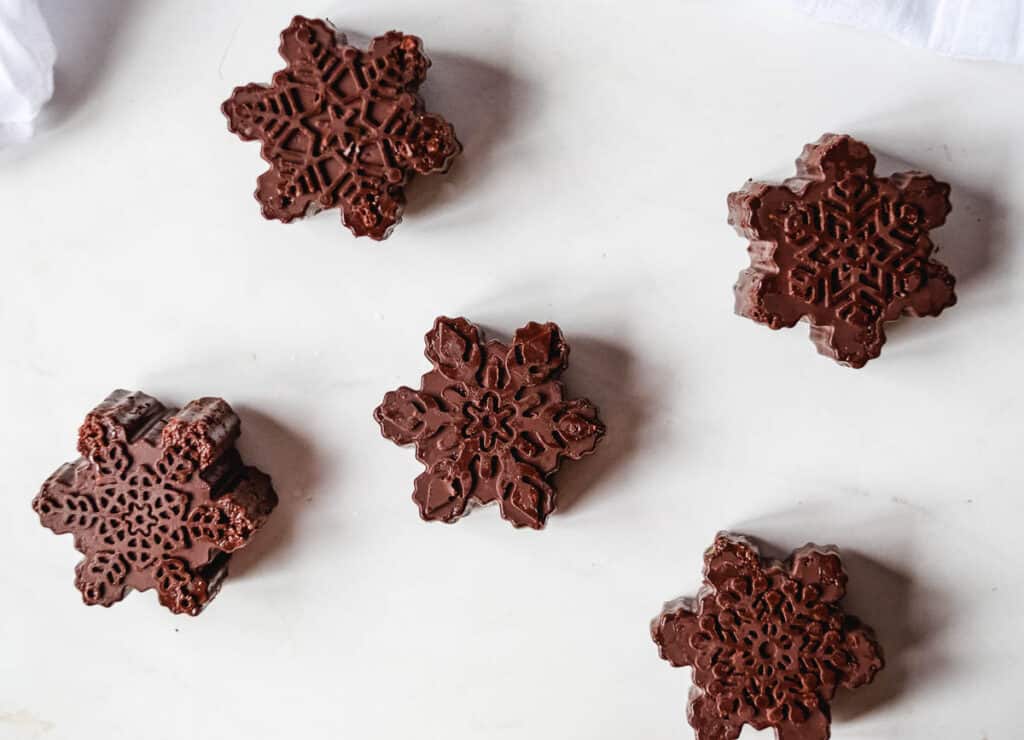 chocolate snowflakes out of their molds