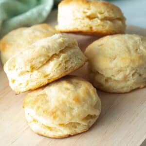 Vegan buttermilk biscuits on a serving board.