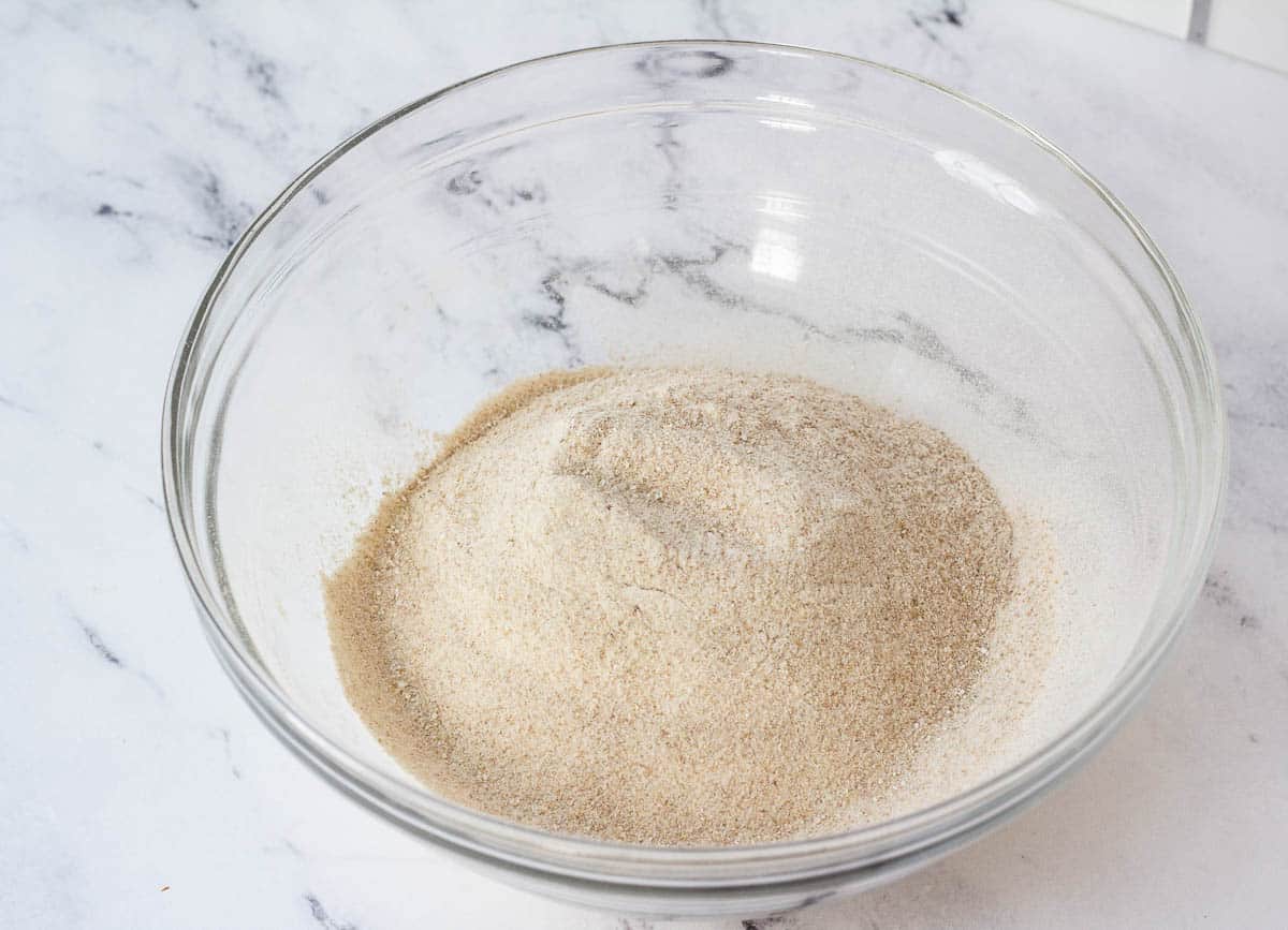 sifted flour in glass bowl