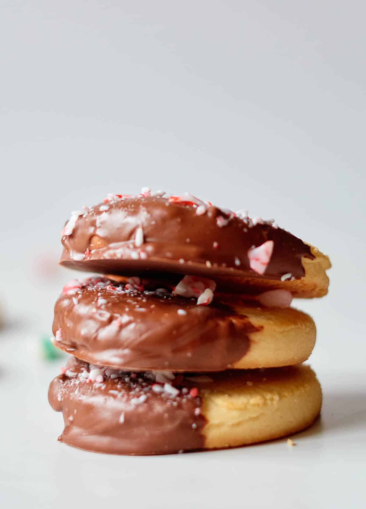 Stack of shortbread cookies dipped in chocolate.